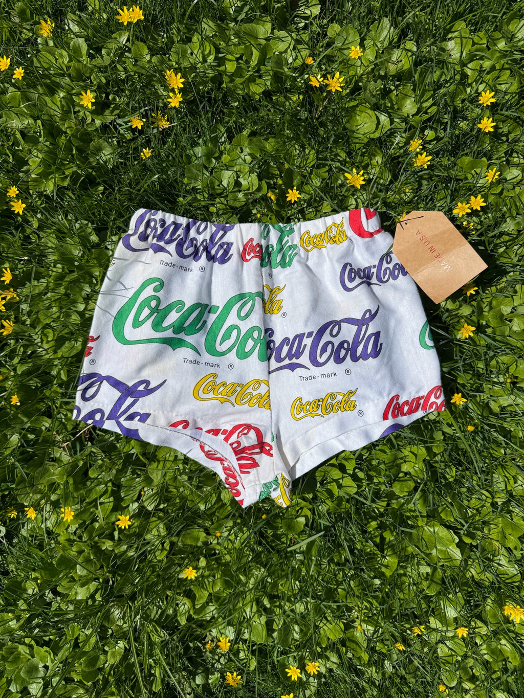 coca cola logo print short shorts