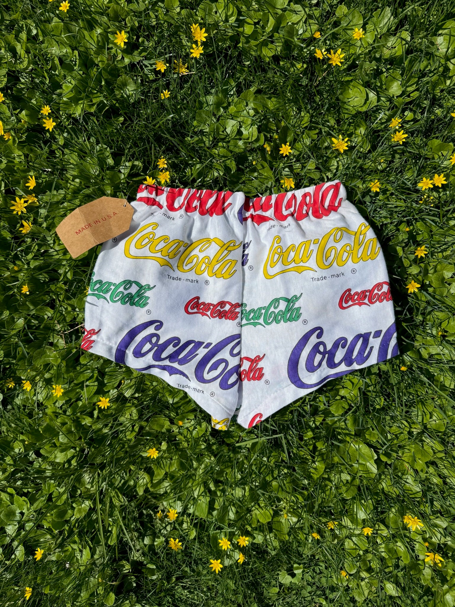 coca cola logo print short shorts